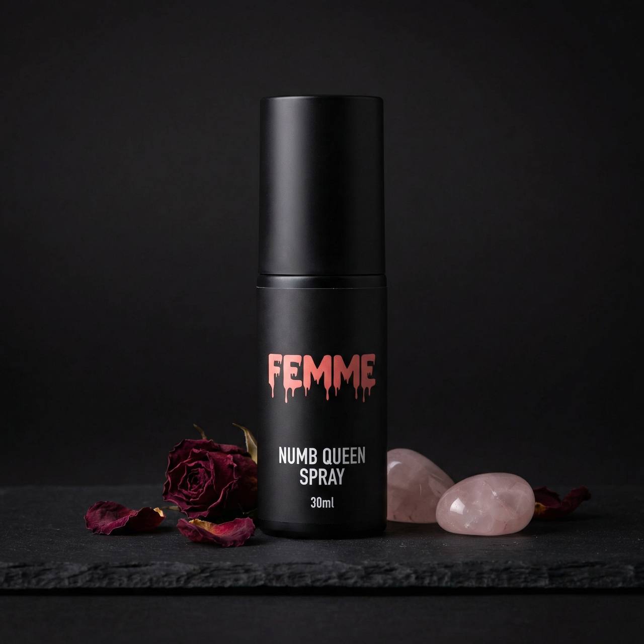Femme Numb Queen Cream 10g — matte black tube with rose petals on dark background